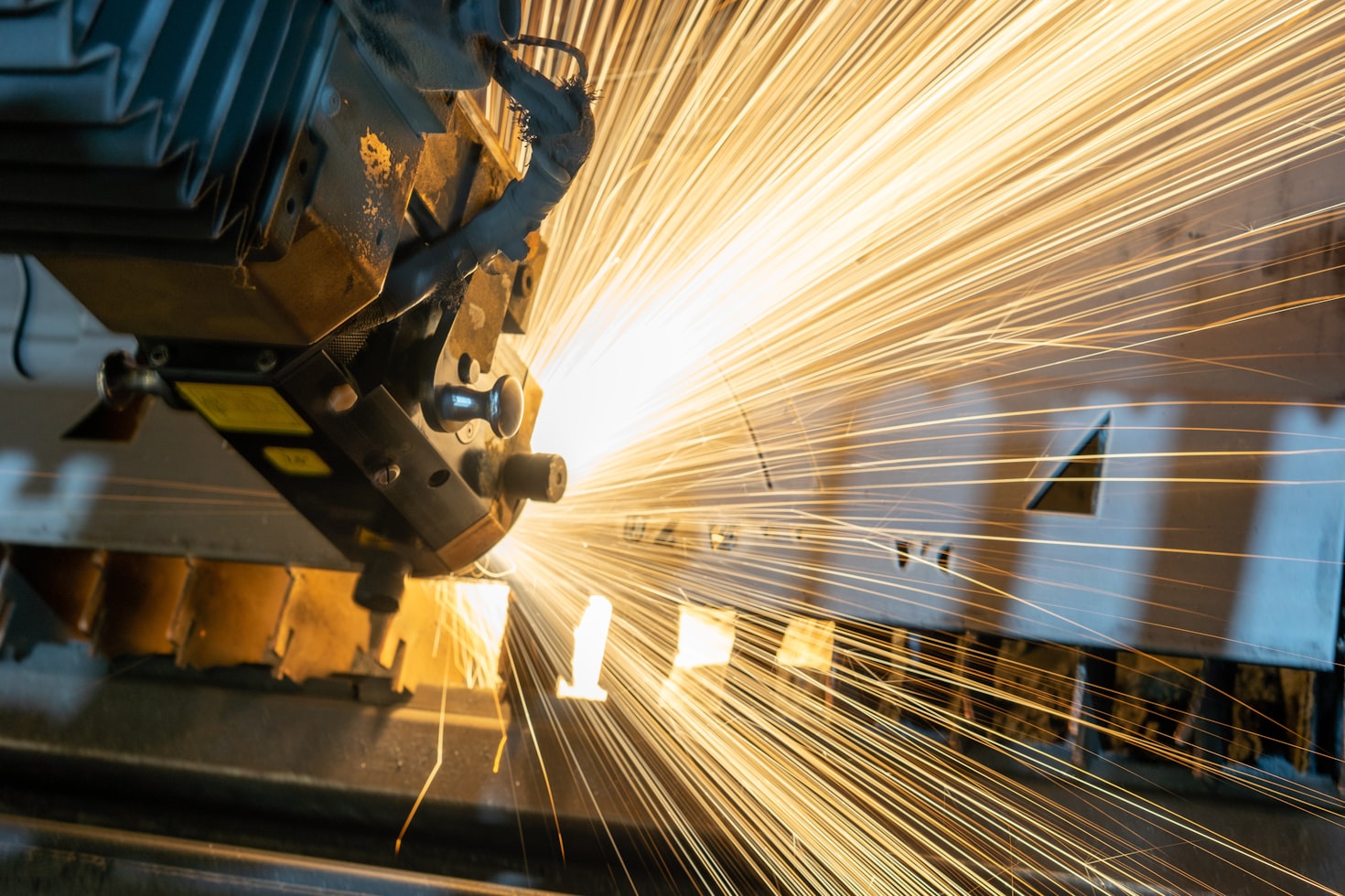 Metalworking machine producing a shower of sparks